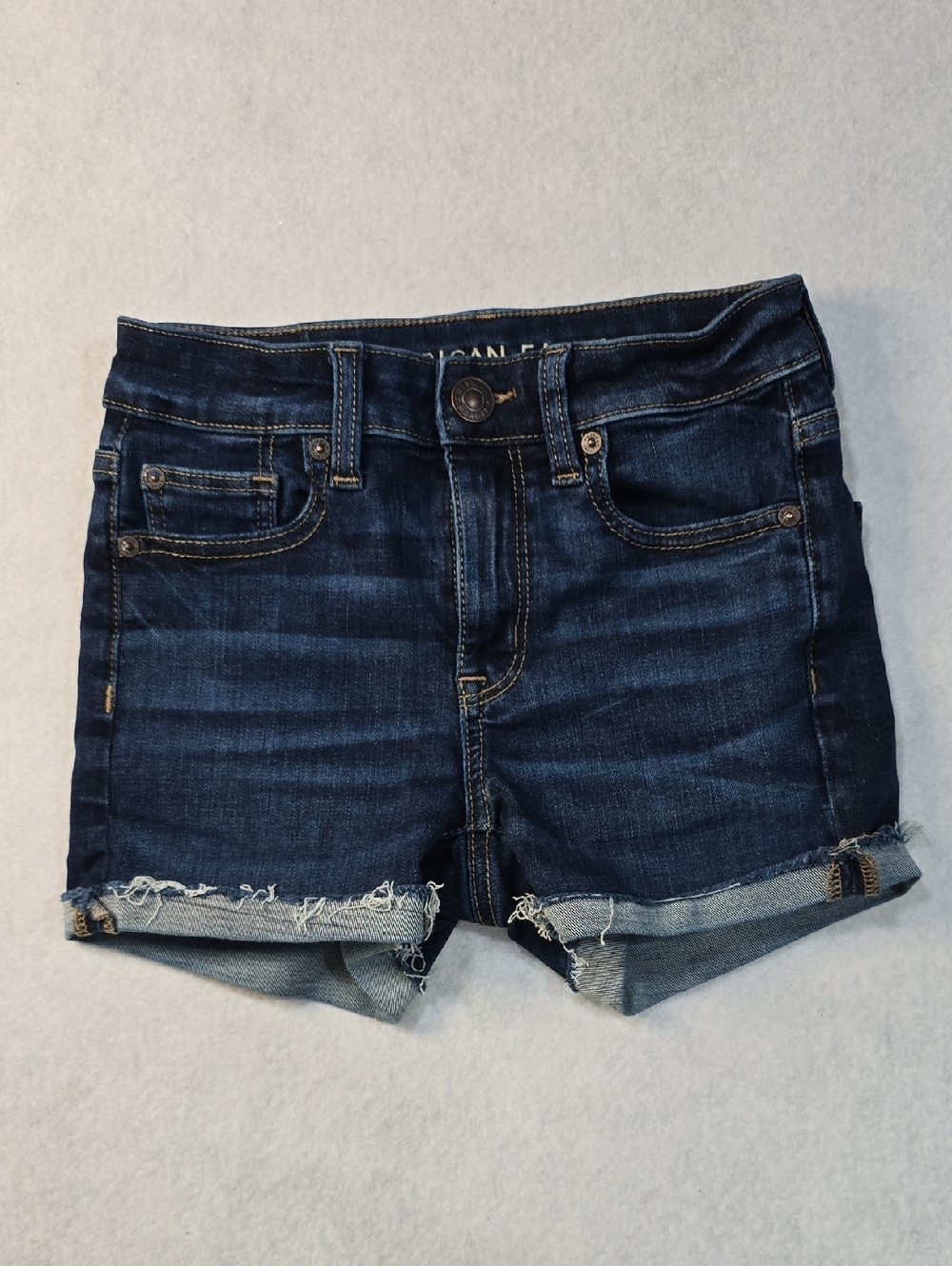 American Eagle Outfitters Dark Blue Rolled Cuff Frayed Denim Shorts Size 00